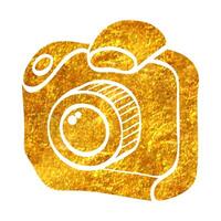 Hand drawn Camera icon in gold foil texture vector illustration