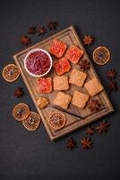 Delicious nutritious sandwiches with peanut butter, strawberry jam photo