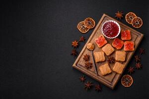 Delicious nutritious sandwiches with peanut butter, strawberry jam photo