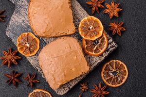 Delicious hearty sandwich with toast bread and peanut butter photo