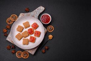 Delicious nutritious sandwiches with peanut butter, strawberry jam photo