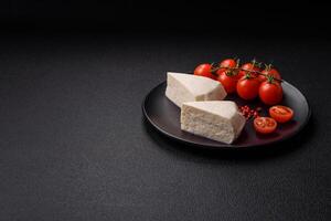 Delicious fresh white young cheese from cow's or sheep's milk photo