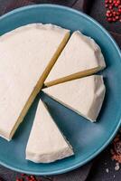 Delicious fresh white young cheese from cow's or sheep's milk photo