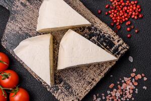 Delicious fresh white young cheese from cow's or sheep's milk photo