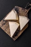 Delicious fresh white young cheese from cow's or sheep's milk photo