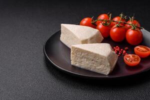 Delicious fresh white young cheese from cow's or sheep's milk photo