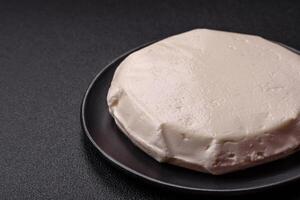 Delicious fresh white young cheese from cow's or sheep's milk photo