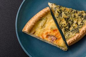 Delicious crispy quiche cut into slices with cheese, broccoli, tomatoes photo