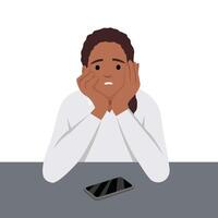 Sad girl waiting for a call or a message on her cell phone vector