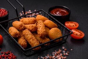 Delicious nuggets, rings and balls of mozzarella and parmesan cheese photo