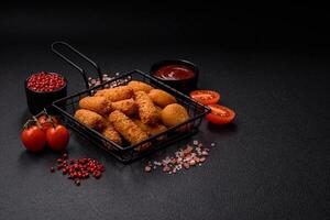 Delicious nuggets, rings and balls of mozzarella and parmesan cheese photo