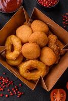 Delicious nuggets, rings and balls of mozzarella and parmesan cheese photo