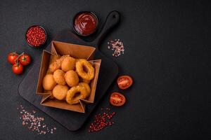 Delicious nuggets, rings and balls of mozzarella and parmesan cheese photo