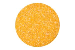 Corn grains or particles are yellow in color when raw photo