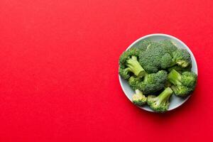 broccoli of fresh green broccoli in bowl over coloredbackground. , close up. Fresh vegetable photo