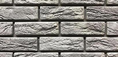 Grey brick wall texture background. Interior design concept with copy space photo