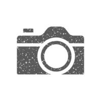 Camera icon in grunge texture vector illustration