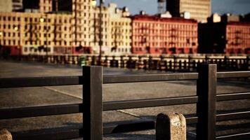 A bench sitting in front of a city skyline video