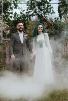 the first wedding dance of the bride and groom in the glade photo