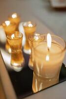 atmospheric candle decor with live fire on the banquet table photo