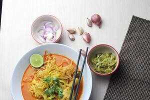 Khao Soi Kai, Thai noodle soup with coconut milk photo