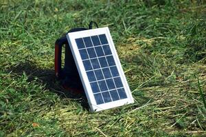 The small compact solar battery for tourism. photo