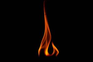 Hot flames on a black background. Beautiful flame of fire in the dark. Abstract of burning flames and smoke. photo