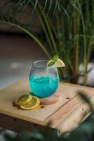 blue and red cocktails with lime for summer drinks photo