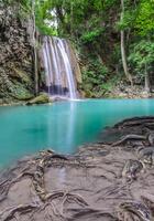 Beautiful deep forest waterfall of Erawan waterfall in Kanchaburi, Thailand photo