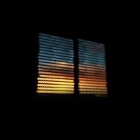 A Window With Blinds in the Dark Ukraine Flag photo