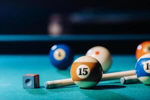 Billiard table with green surface and balls in the billiard club.Pool Game photo