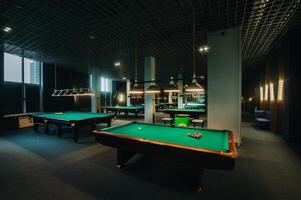 Billiard table with green surface and balls in the billiard club.Pool Game photo