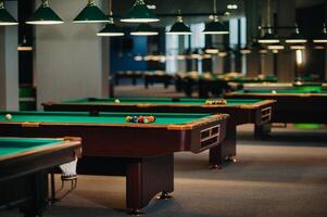 Billiard table with green surface and balls in the billiard club.Pool Game photo