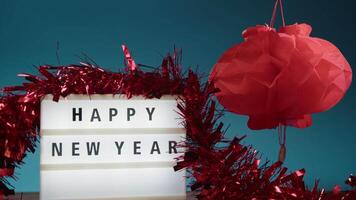 Happy New Year Signboard And Chinese Lantern video