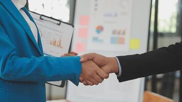 Close-up view of business partnership handshake, Photo of two businessman handshaking process. Successful deal after great meeting. Horizontal, flare effect, blurred background handshake concept. video