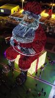 Vertical Video of Iluminated Santa Claus City Decoration