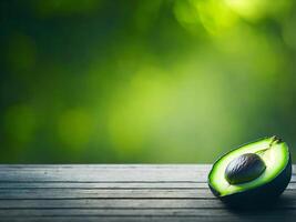 Fresh green avocado on horizontal background. Exotic nourishment, bio product. photo