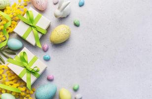 Festive Easter Celebration With Decorated Eggs and Gifts on a Light Background photo