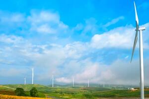 Wind turbines on the mountain of nature on blue sky at Khao Kho, Phetchabun, Thailand photo