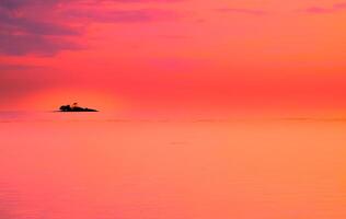 Beautiful sunset over the sea.sky on twilight time and reflection on the sea pink background for travel in holiday relax time photo