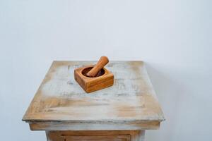 wooden stupa, stupa for grinding grasses, made by hand photo