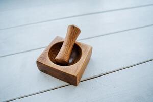 wooden stupa, stupa for grinding grasses, made by hand photo