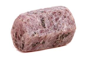 Macro mineral stone Ruby in the breed a white background photo