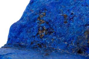 Macro Azurite mineral stone with Pyrite inserts on a white background photo