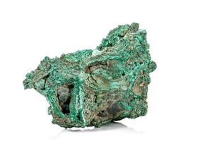 Macro stone Malachite mineral on white background photo