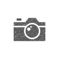 Camera icon in grunge texture vector illustration