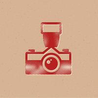 Old camera halftone style icon with grunge background vector illustration