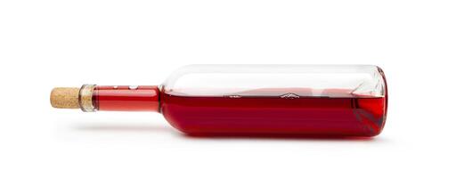 Closeup of a red wine bottle on a white background. photo