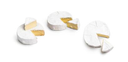 Fresh slice Camembert cheese natural on white background photo