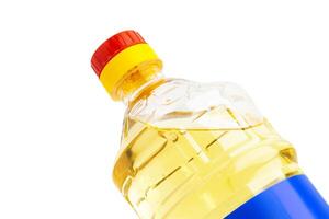 Oil in plastic bottle isolated on white background photo